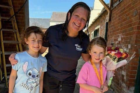 Evie, Chloe and Water Babies teacher Claire Hillsdon.