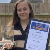 Kelsie Wright with her Proud of Bucks award