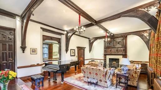 One of seven reception rooms, this one contains a grand piano and a variety of comfy setees.