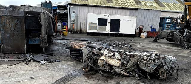 The wreckage after the van is destroyed