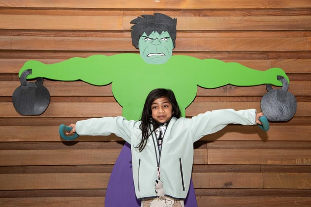 Posing with the Hulk. Photo by Derek Pelling
