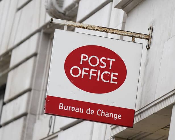 A Post Office sign. (Photo from Aaron Chown/PA Wire )
