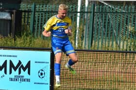 Jake Baldwin celebrates a Dynamos goal.