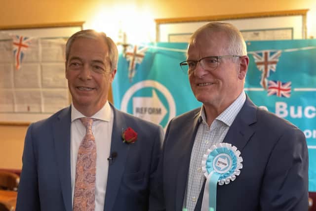 Nigel Farage with another Reform UK member. Photo from Charlie Smith/Local Democracy Reporting Service