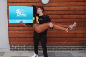 Viktoria and Brandon celebrating Viktoria's Pro Card Win
