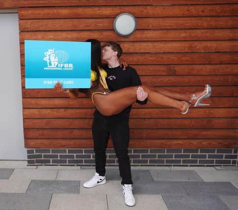 Viktoria and Brandon celebrating Viktoria's Pro Card Win