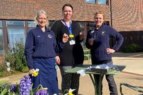 Zoey Pullar, lead nurse for the NSIC, Natalie Eggleton, NHS Staff member, and Amy Moffett, head gardener of Horatio’s Garden Stoke Mandeville, casting their thumbprints in the charity’s garden for Horatio’s Garden Chelsea