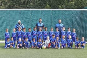 Stoke Mandeville Junior FC, under 7s Bucks and Stags sporting their new kit with Volunteer Coaches Liam, Marcus and Carl