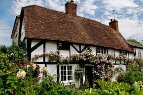 An outside view of The Walk, a Grade II listed 17th-century cottage in Winslow, which is on the market now with a guide price of £550,000