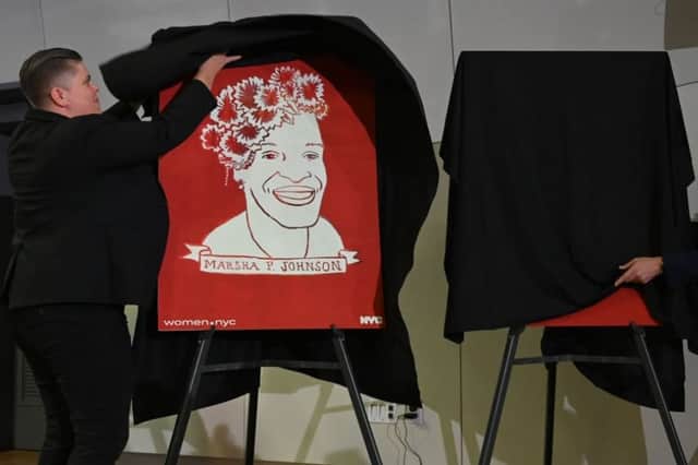 A poster of transgender activist Marsha P. Johnson is unveiled during an event at the The Lesbian, Gay, Bisexual & Transgender Community Center in New York in May 2019 (Photo: TIMOTHY A. CLARY/AFP via Getty Images)