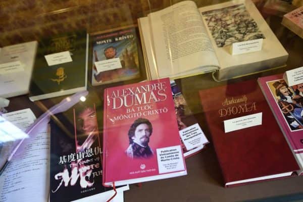 A selection of works by Alexandre Dumas translated into different languages (Photo: MIGUEL MEDINA/AFP via Getty Images)
