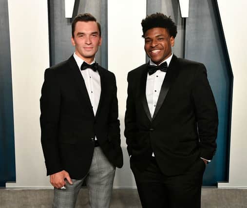 The TV star, pictured right, has been arrested on charges of producing child sex images (Photo: Getty Images)