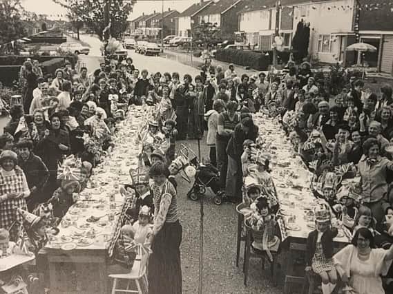 Revelers take to the streets to celebrate the Queen's Silver Jubilee in 1977 in Bedgrove, Aylesbury