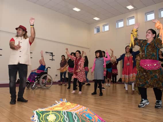 Teacher Jay Kumar leads a Bollywood dance class at the Healthy Living Centre, Aylesbury