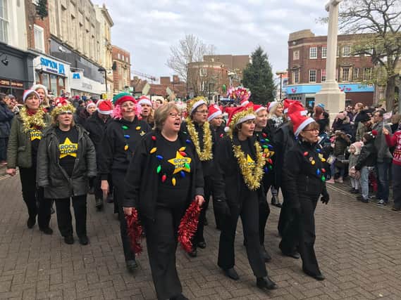 Aylesbury Rock Choir take part in the Santa parade