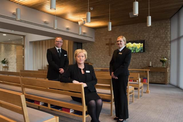 Heather Dyson, Crematorium manager (centre) with colleagues