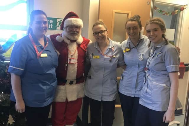 Father Christmas visits staff at Stoke Mandeville Hospital