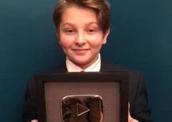Zac Bartley with his award from YouTube