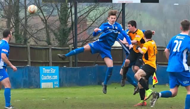 Jack Wood heads in during United's win over Barton at the weekend. Picture: Mike Snell