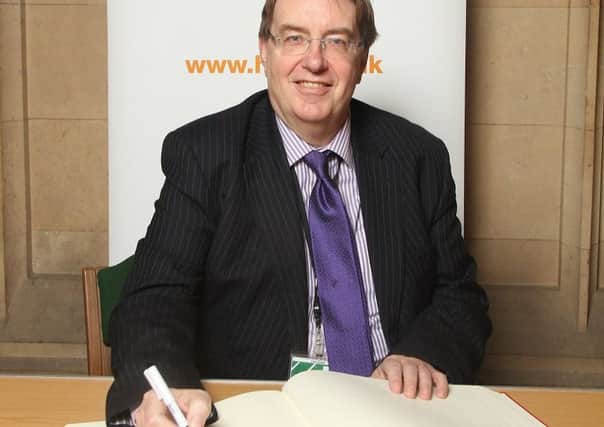 MP John Howell signs the Holocaust Educational Trusts Book of Commitment