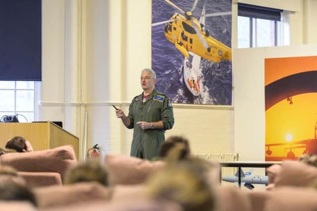 Group Capt Mark Manwaring, a fast jet navigator, briefed the children about the theory of flight and his own adventure circumnavigating the world