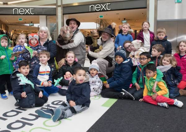 Friars Square Shopping Centre half term event - Caveman Capers - children pictured with some of the performers