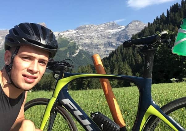 Alex Clark cycling in Switzerland.