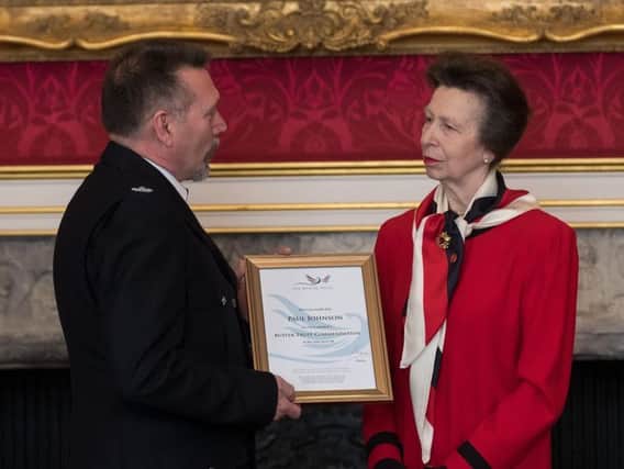 Paul Johnson, a wing officer, and Tressa Vaill, the prison visits manager, received their commendations from the Butler Trust, which has The Princess Royal as its patron