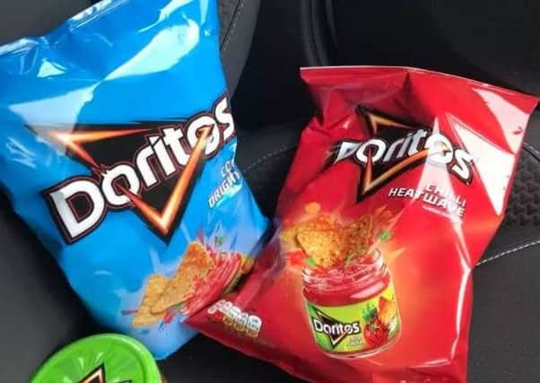 Doritos is offering to pay someone Â£18,000 to eat crisps for a living. Picture: Twitter