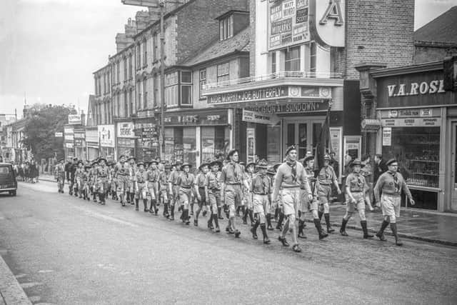 Scouts marching up Aylesbury High Street for St George's Day in April 1961.