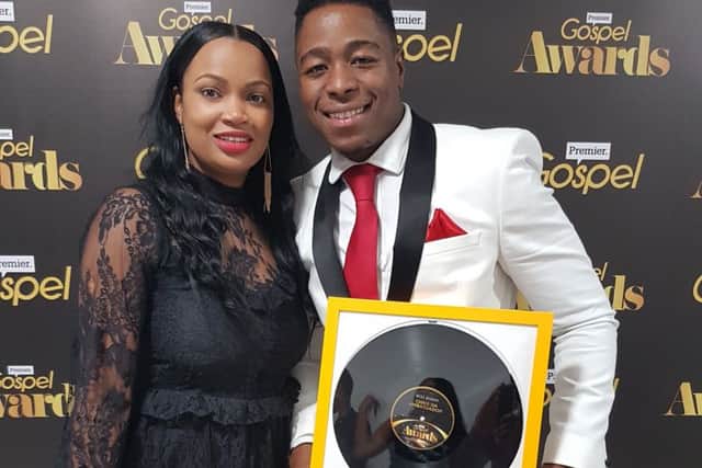 Aylesbury's very own reggae artist of the year with his wife and award