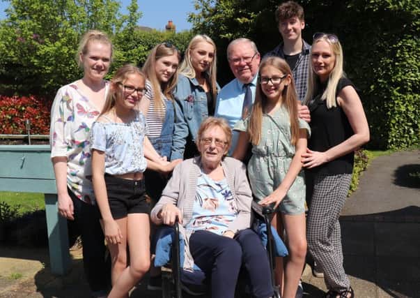 Roy and Jean Dennis with members of their family at Carey Lodge Care Home, Wing