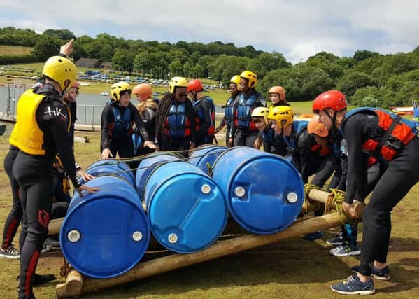 Action4Youth youngsters doing raft building