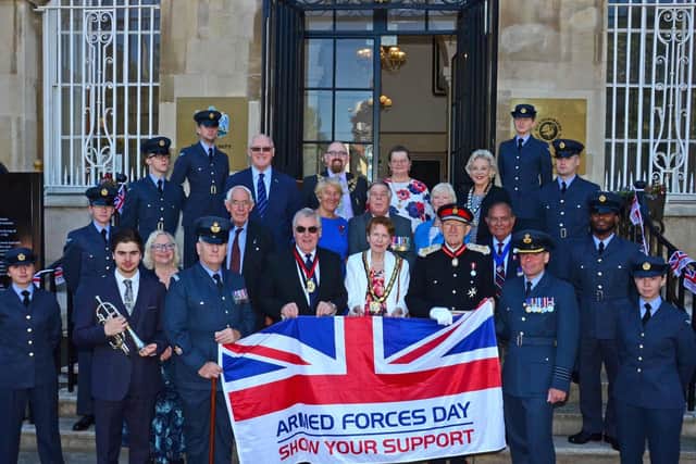 Armed Forces Day flag raising group