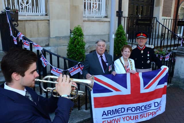 Armed Forces Day flag raising with bugler Max Farmer, Lt Colonel John Williams, Chairman Netta Glover and Lord Lieutenant Sir Henry Aubrey-Fletcher
