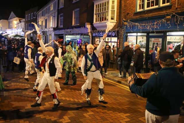 Whitchurch Morris Men dancing during one of the Christmas light switch-on events in Tring
