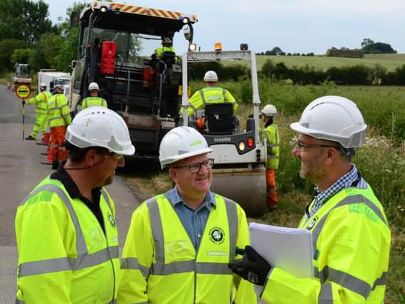 Mark Shaw meets Eurovia Surfacing supervisor Martin Graves (L) and TfB's Kevin Allen (R) with one of the surfacing crews who will work on Stoke Hammond bypass