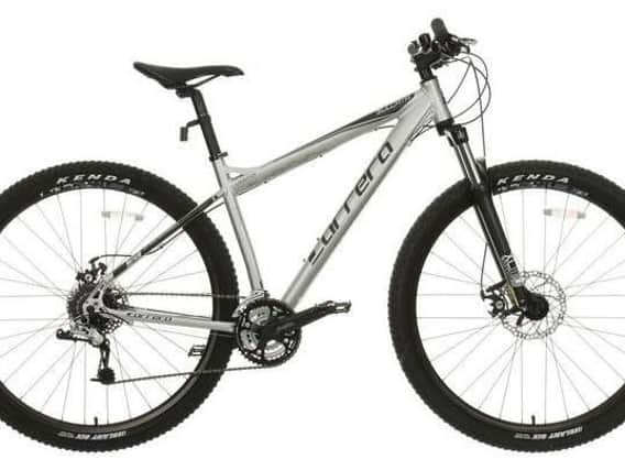 Image shows a white Carrera Solcata bike similar to the one stolen from Halfords in Aylesbury