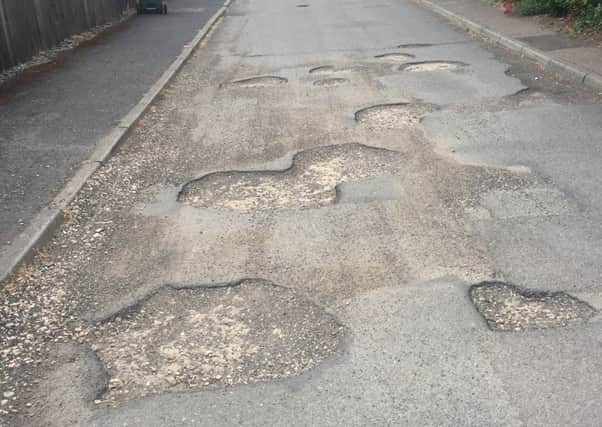 Bernards Close in Chearsley - residents are frustrated at the amount of potholes on the road