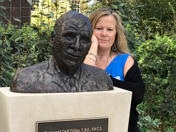 Artist Julia Beer with her statue of Sir Harold Gillies