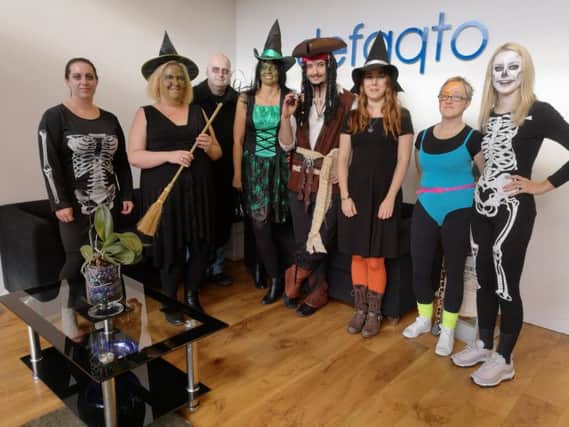 Staff at Defaqto in Haddenham host a Halloween fundraising evening