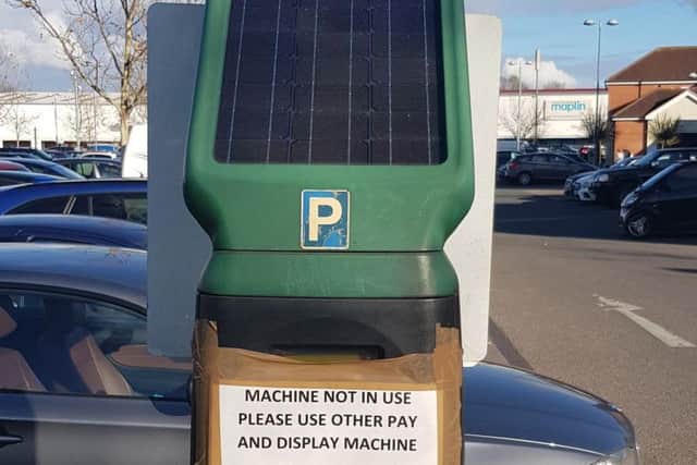 The ticket machine in question at Aylesbury Shopping Retail Park with out or order sign and solar panel on top