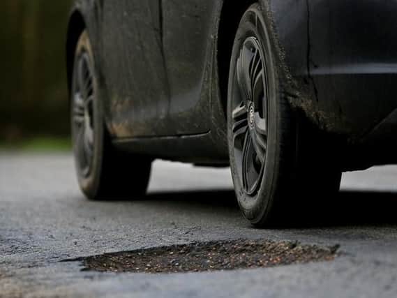 How quickly does Bucks County Council fill in dangerous potholes?