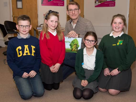 Bucks children's writing competition in aid of the Florence Nightingale Hospice - pictured are the winner Tilly Taylor (front right) - Long Crendon School.
From left are second place author Alfie Toms from Bedgrove Junior School, third place author Matilda Clarke from Wendover Junior School and fourth place author Lily Rea from Long Crendon School. Back of the photo is author Nick Halliday