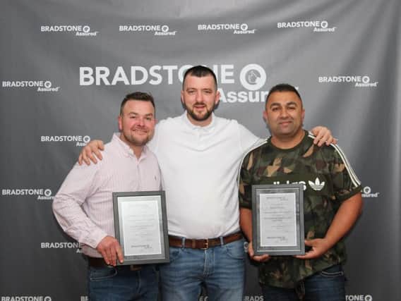 Jonathan Rogers (left) from Dynamic Landscaping and brothers Warren and Nathan Iqbal from Haydon Hill Paving with their awards