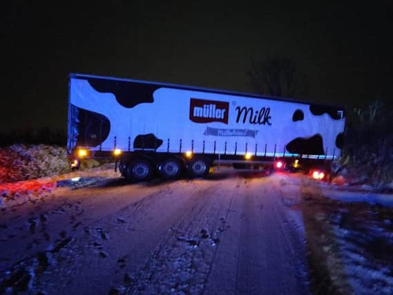 The snowy weather led to this milk lorry getting stuck on the A421 this morning