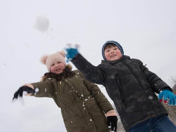 Hundreds of schoolchildren including siblings Lauren and Max Bace are having a day off due to the snow