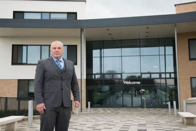 Aylesbury Vale Academy principal Roger Burman outside the school