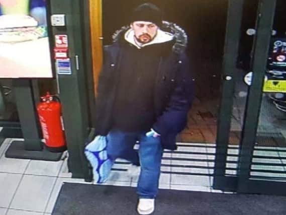 Police have released CCTV in connection with a handbag theft from McDonald's in Aylesbury