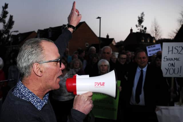 Councillor Frank Mahon rallies the protesters in Calvert Green